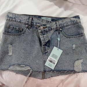 REVICE Light Blue Distressed Denim Mini Skirt